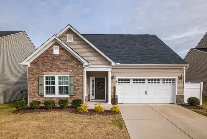 Professionally retouched real estate photo showing enhanced lighting, vibrant colors, and a clean, inviting property exterior